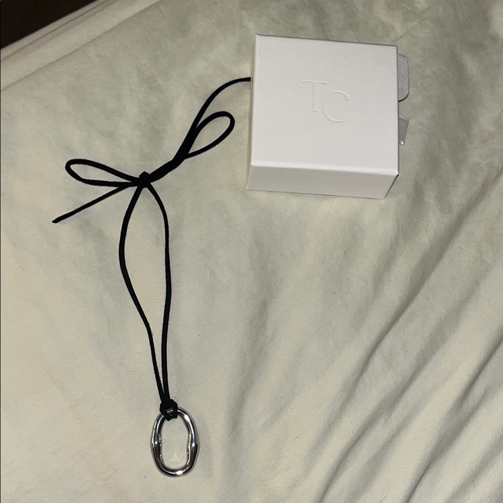 Silver Pendant Necklace with Black Cord